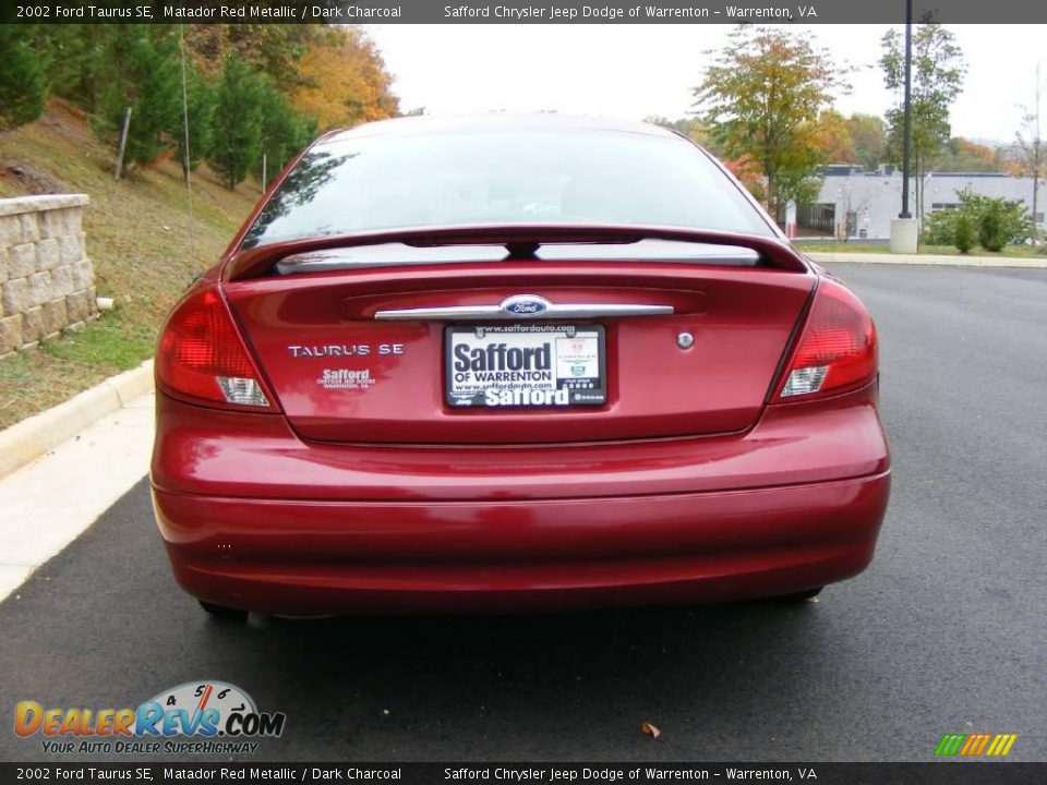 2002 Ford Taurus SE Matador Red Metallic / Dark Charcoal Photo #6