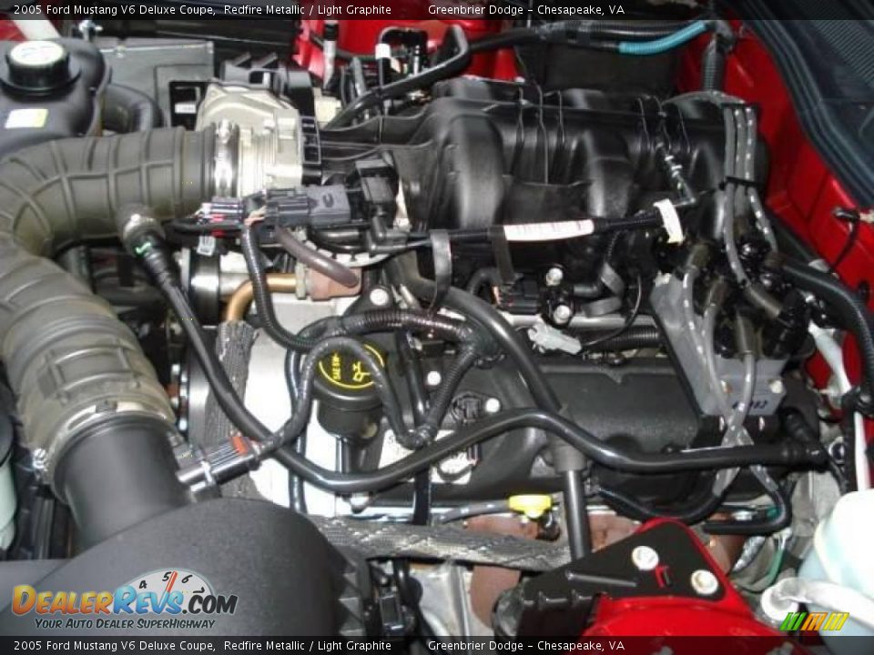 2005 Ford Mustang V6 Deluxe Coupe Redfire Metallic / Light Graphite Photo #30