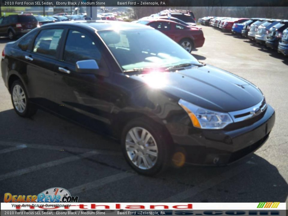 2010 Ford Focus SEL Sedan Ebony Black / Medium Stone Photo #4