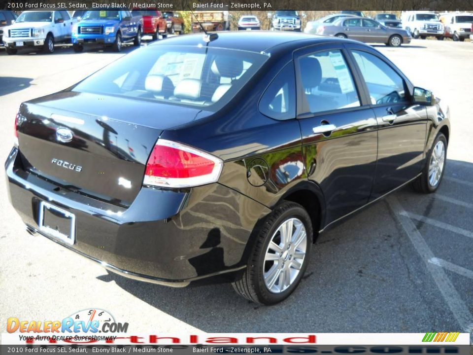 2010 Ford Focus SEL Sedan Ebony Black / Medium Stone Photo #6