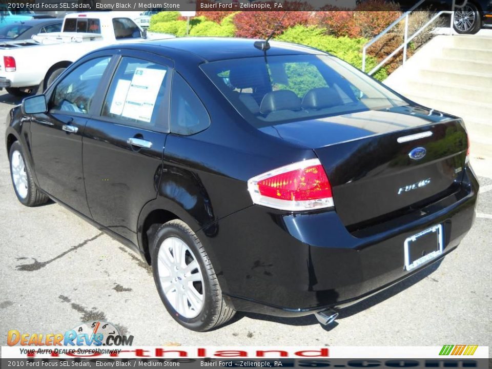 2010 Ford Focus SEL Sedan Ebony Black / Medium Stone Photo #8