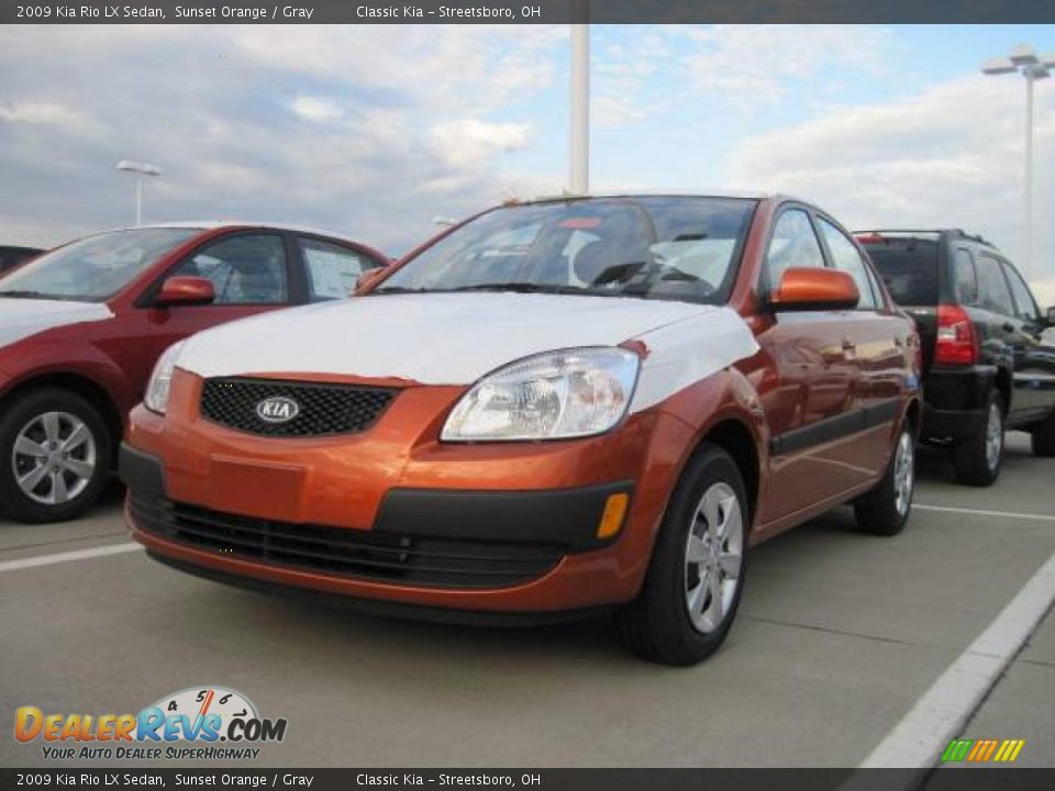 2009 Kia Rio LX Sedan Sunset Orange / Gray Photo #1
