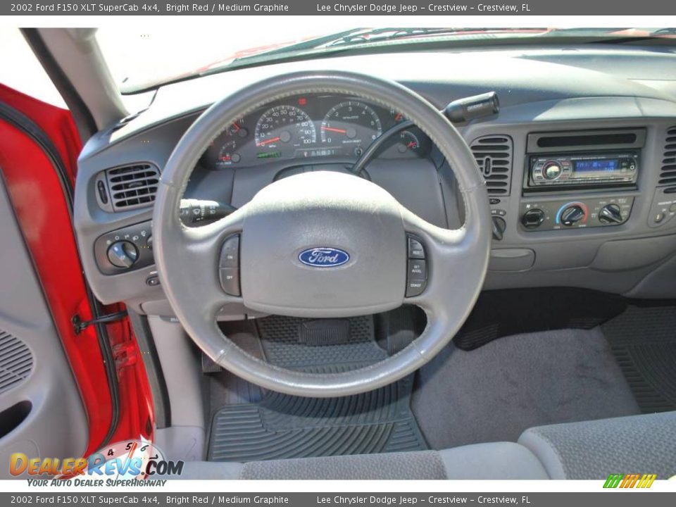 2002 Ford F150 XLT SuperCab 4x4 Bright Red / Medium Graphite Photo #22