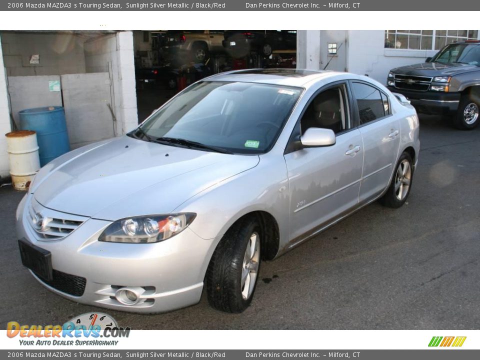 2006 Mazda MAZDA3 s Touring Sedan Sunlight Silver Metallic / Black/Red Photo #1