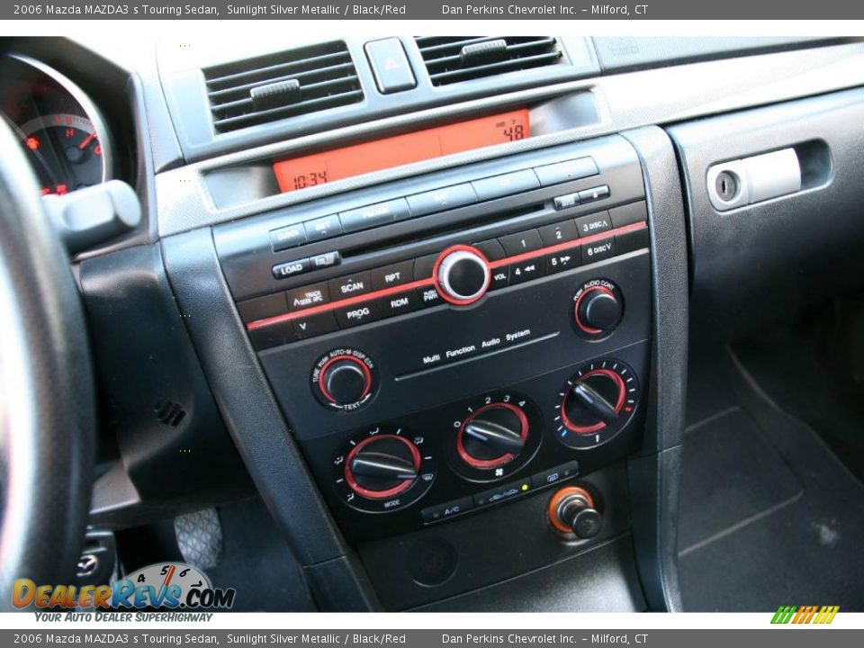 2006 Mazda MAZDA3 s Touring Sedan Sunlight Silver Metallic / Black/Red Photo #10