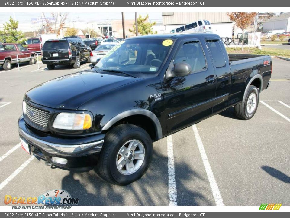 2002 Ford F150 XLT SuperCab 4x4 Black / Medium Graphite Photo #1