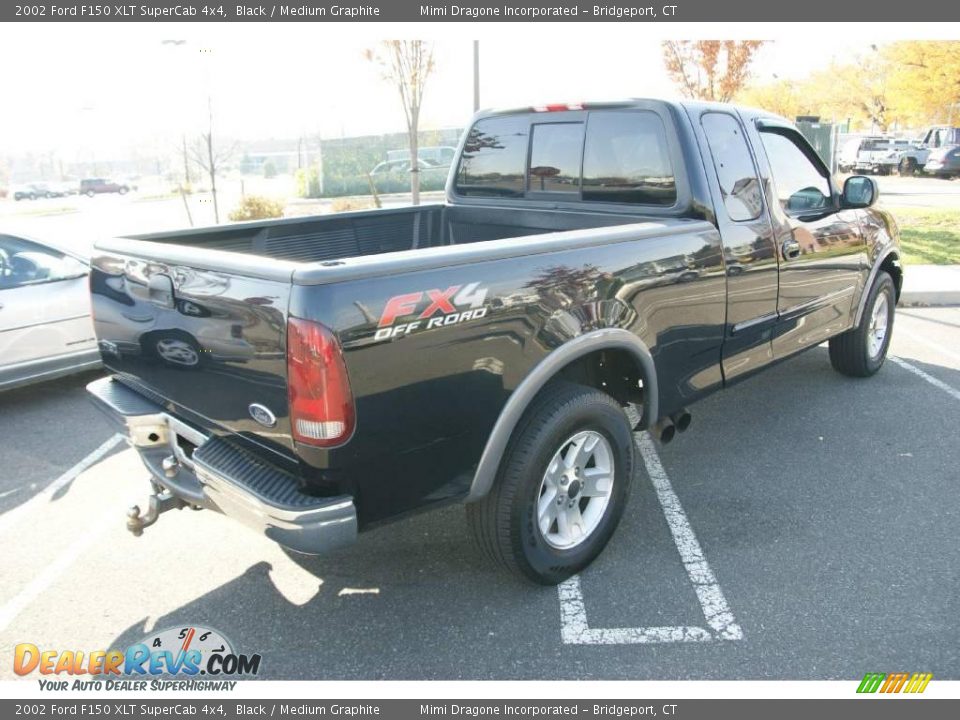 2002 Ford F150 XLT SuperCab 4x4 Black / Medium Graphite Photo #4