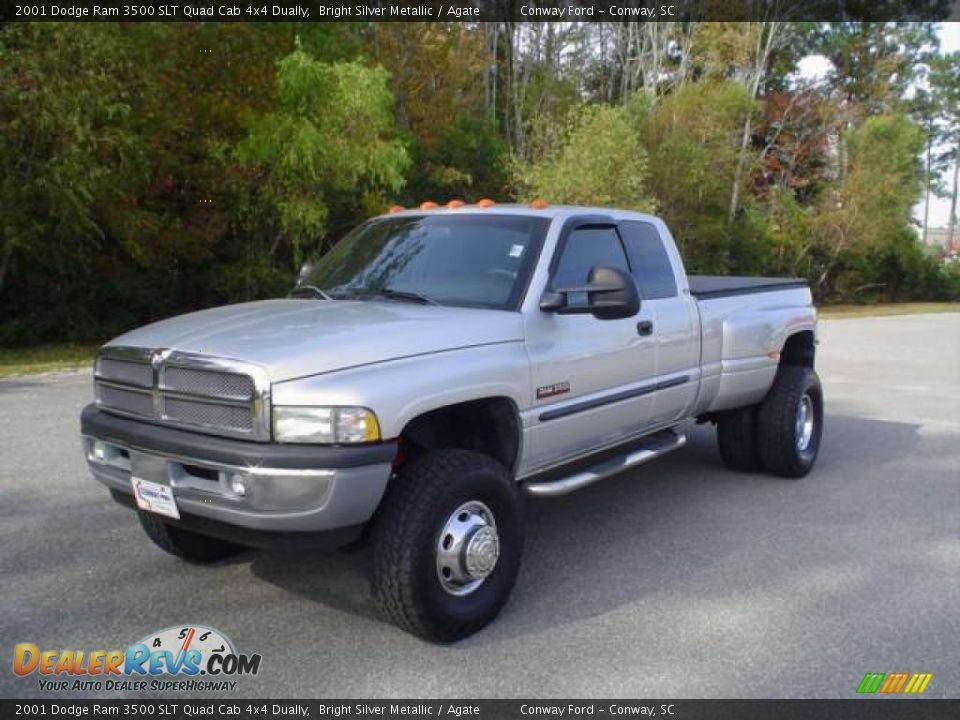 Front 3/4 View of 2001 Dodge Ram 3500 SLT Quad Cab 4x4 Dually Photo #1