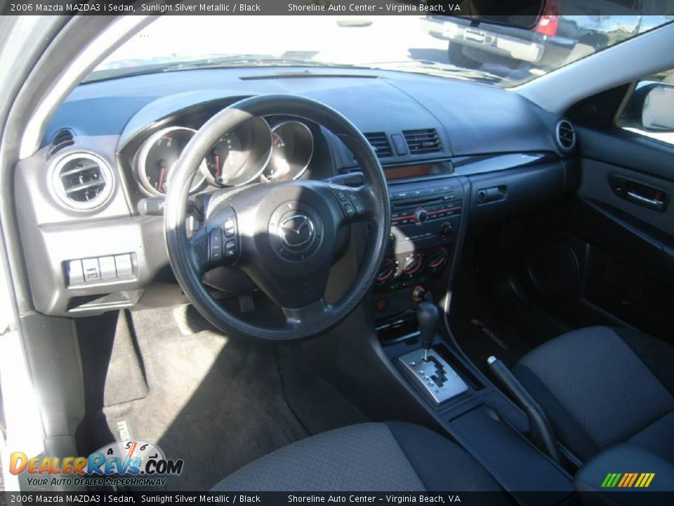 2006 Mazda MAZDA3 i Sedan Sunlight Silver Metallic / Black Photo #15