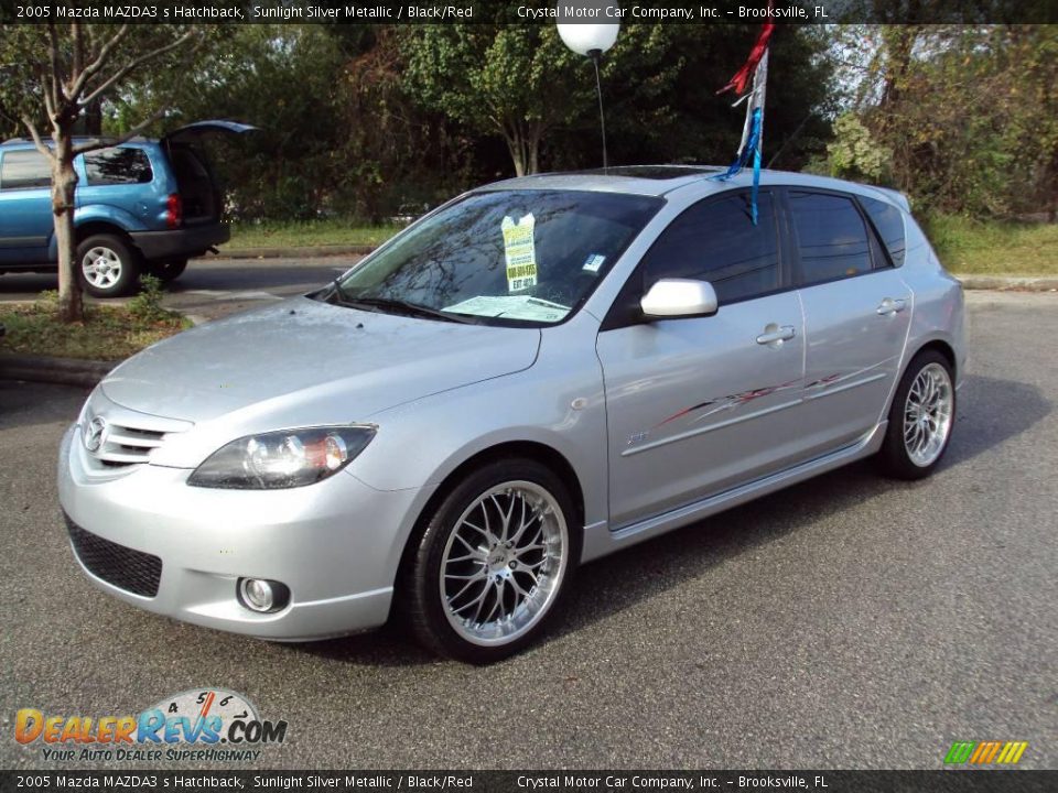 2005 Mazda MAZDA3 s Hatchback Sunlight Silver Metallic / Black/Red Photo #1