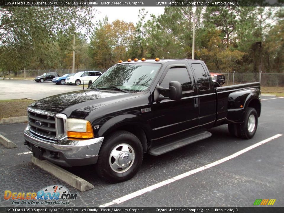 1999 Ford F350 Super Duty XLT SuperCab 4x4 Dually Black / Medium Graphite Photo #1