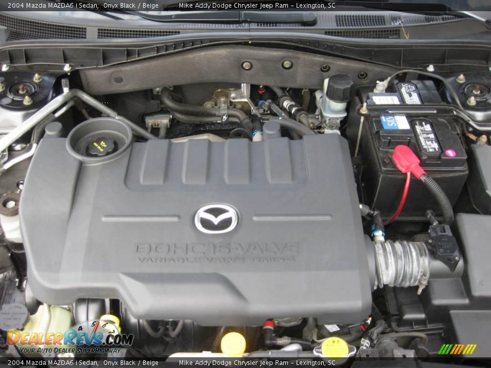 2004 Mazda MAZDA6 i Sedan Onyx Black / Beige Photo #28