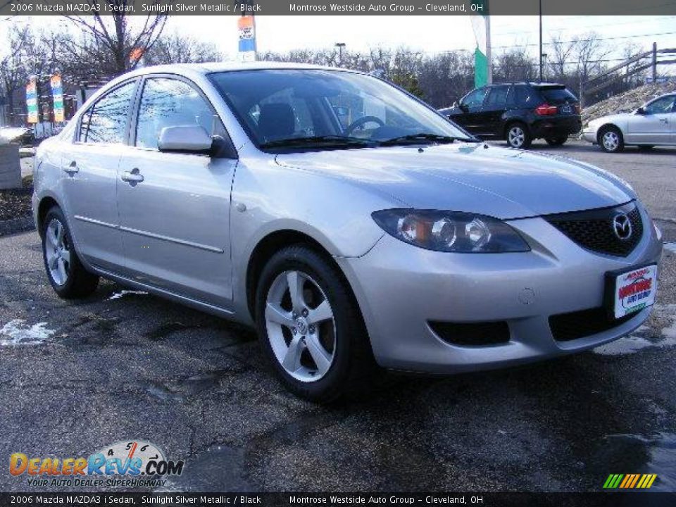 2006 Mazda MAZDA3 i Sedan Sunlight Silver Metallic / Black Photo #7