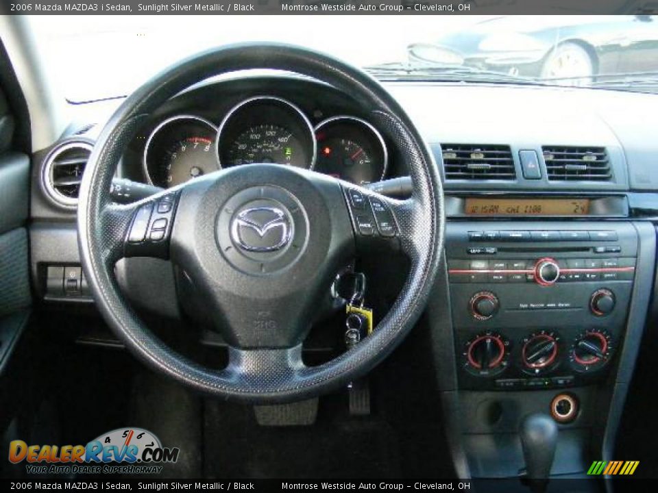 2006 Mazda MAZDA3 i Sedan Sunlight Silver Metallic / Black Photo #15