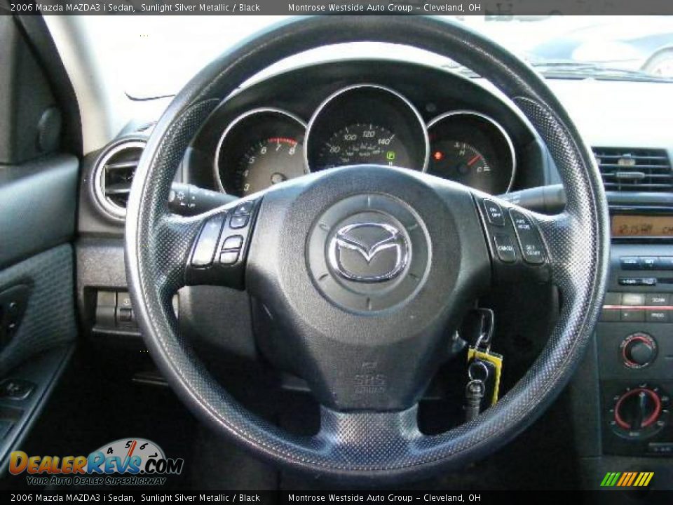 2006 Mazda MAZDA3 i Sedan Sunlight Silver Metallic / Black Photo #16