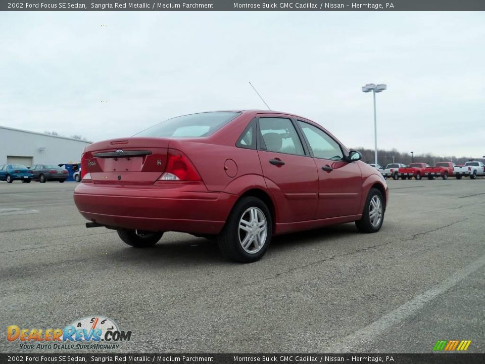 2002 Ford Focus SE Sedan Sangria Red Metallic / Medium Parchment Photo #6