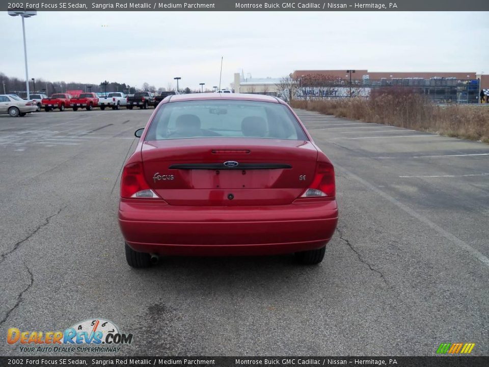 2002 Ford Focus SE Sedan Sangria Red Metallic / Medium Parchment Photo #7