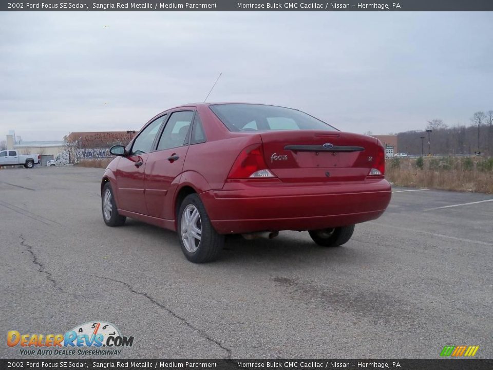 2002 Ford Focus SE Sedan Sangria Red Metallic / Medium Parchment Photo #8