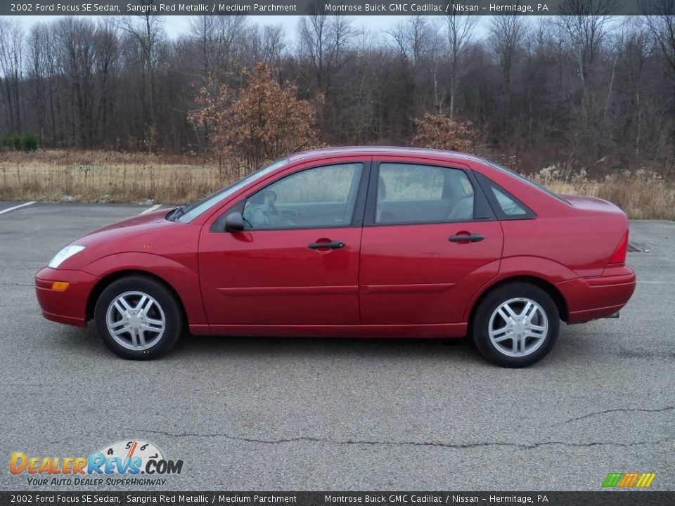 2002 Ford Focus SE Sedan Sangria Red Metallic / Medium Parchment Photo #9