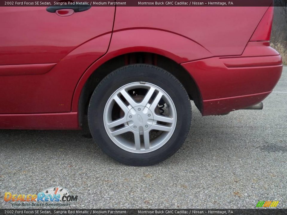 2002 Ford Focus SE Sedan Sangria Red Metallic / Medium Parchment Photo #13