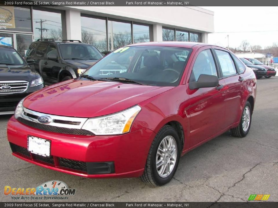 2009 Ford Focus SE Sedan Sangria Red Metallic / Charcoal Black Photo #1