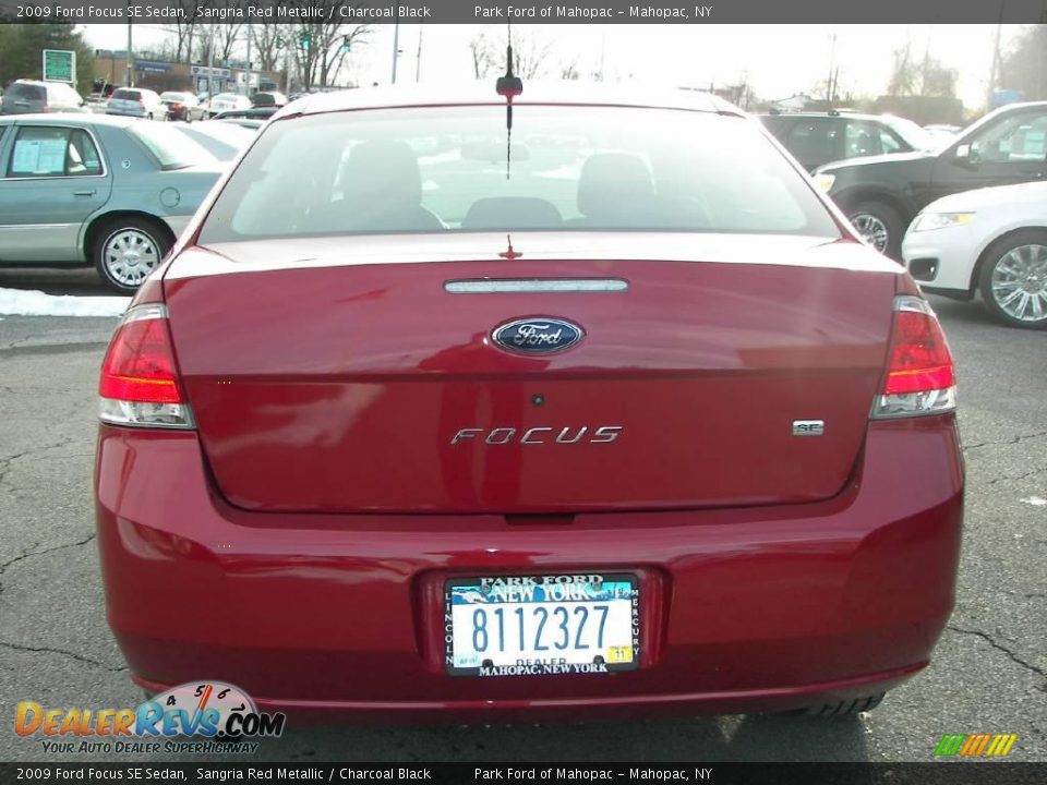 2009 Ford Focus SE Sedan Sangria Red Metallic / Charcoal Black Photo #18