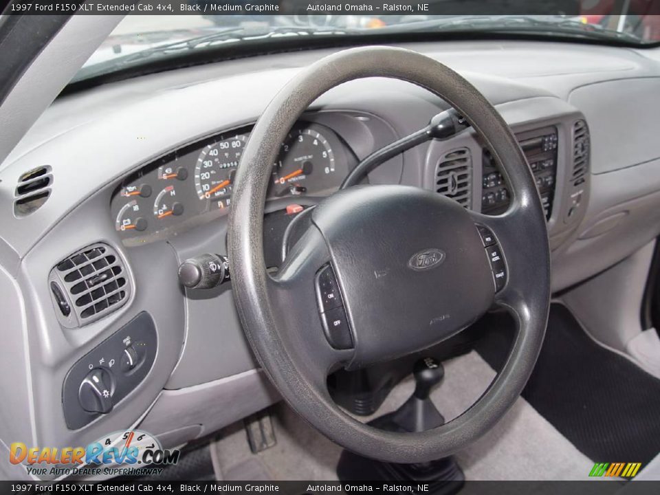 1997 Ford F150 XLT Extended Cab 4x4 Black / Medium Graphite Photo #10