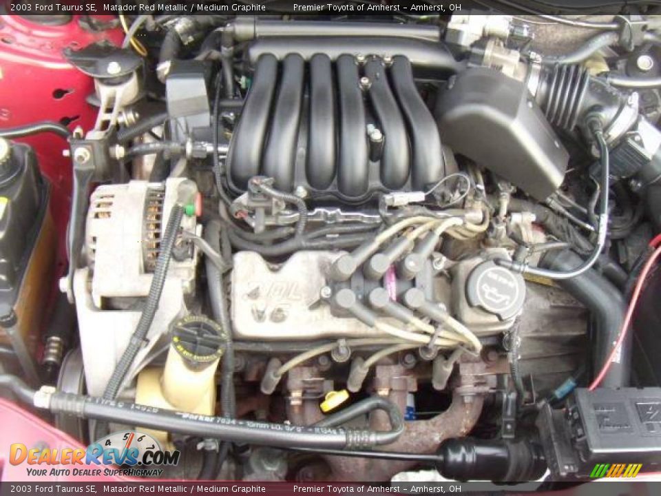 2003 Ford Taurus SE Matador Red Metallic / Medium Graphite Photo #19