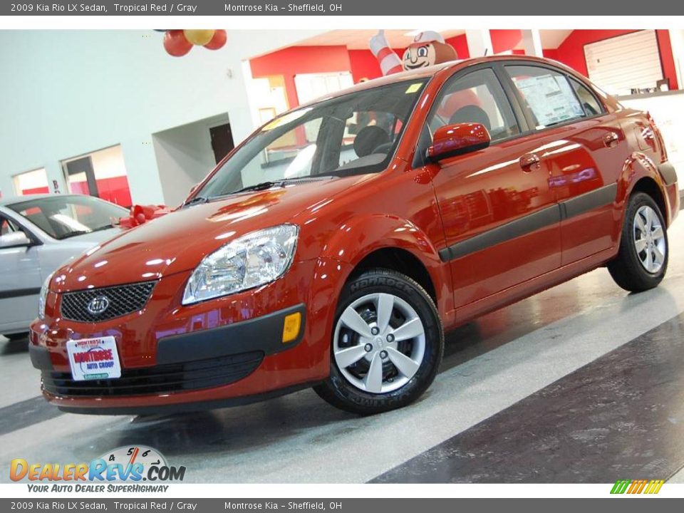 2009 Kia Rio LX Sedan Tropical Red / Gray Photo #1