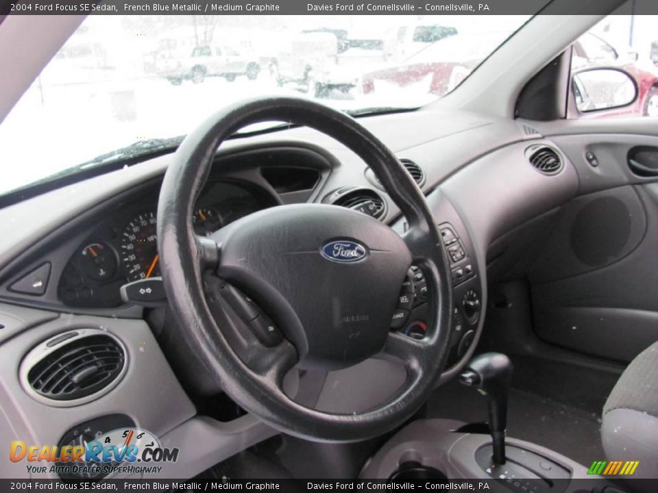2004 Ford Focus SE Sedan French Blue Metallic / Medium Graphite Photo #8