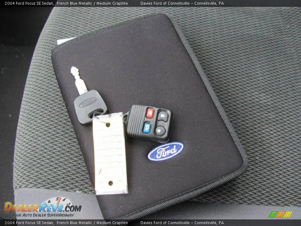 2004 Ford Focus SE Sedan French Blue Metallic / Medium Graphite Photo #12