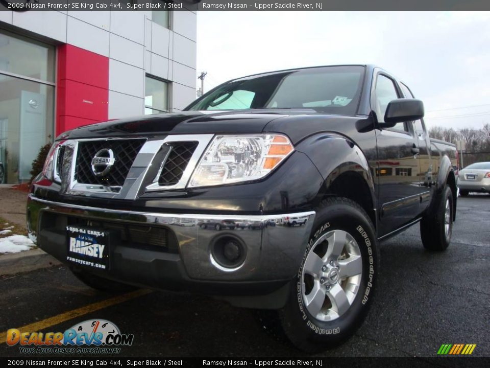 2009 Nissan Frontier SE King Cab 4x4 Super Black / Steel Photo #2