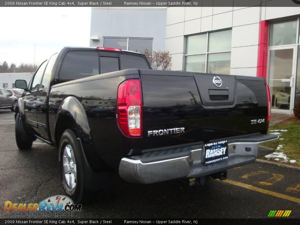 2009 Nissan Frontier SE King Cab 4x4 Super Black / Steel Photo #7