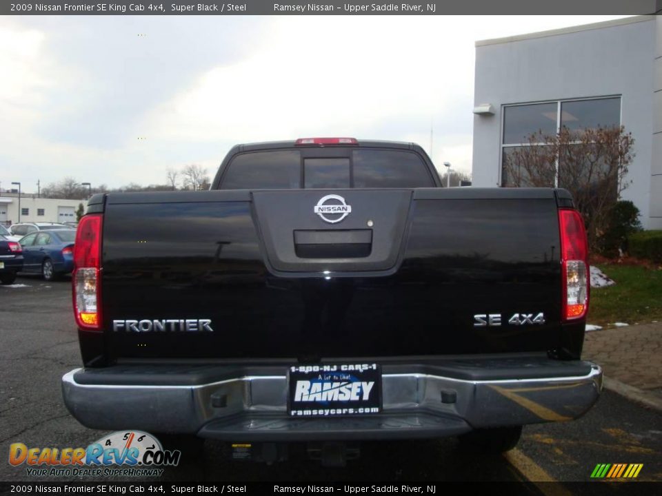 2009 Nissan Frontier SE King Cab 4x4 Super Black / Steel Photo #8