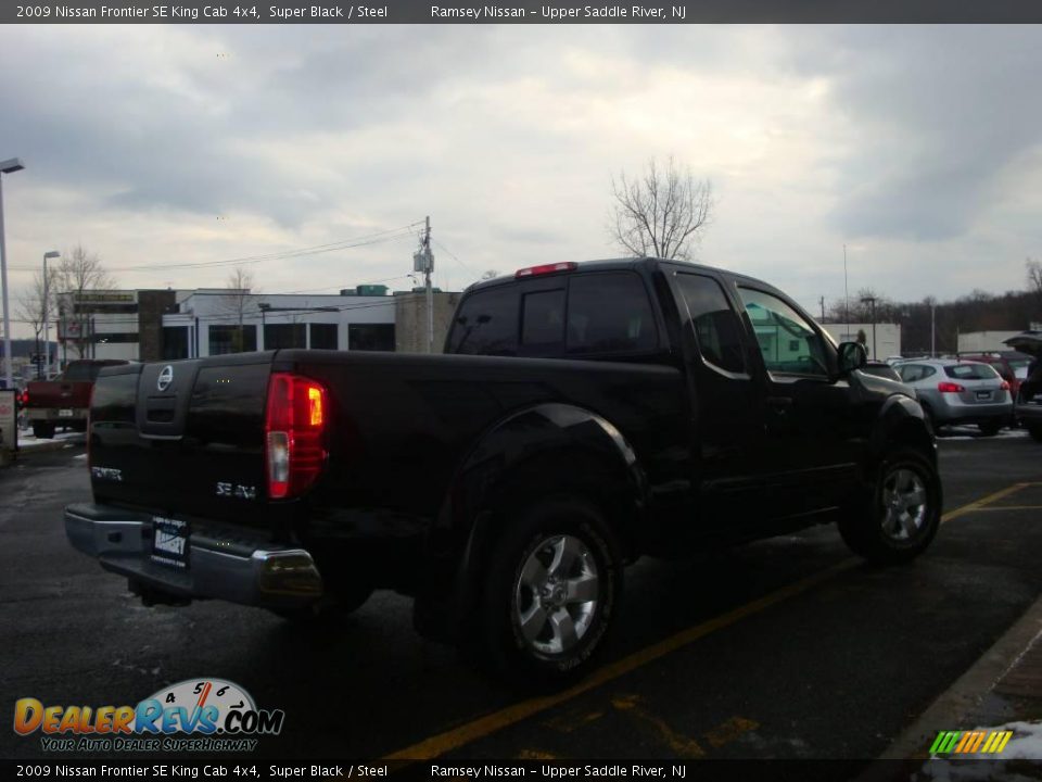 2009 Nissan Frontier SE King Cab 4x4 Super Black / Steel Photo #10
