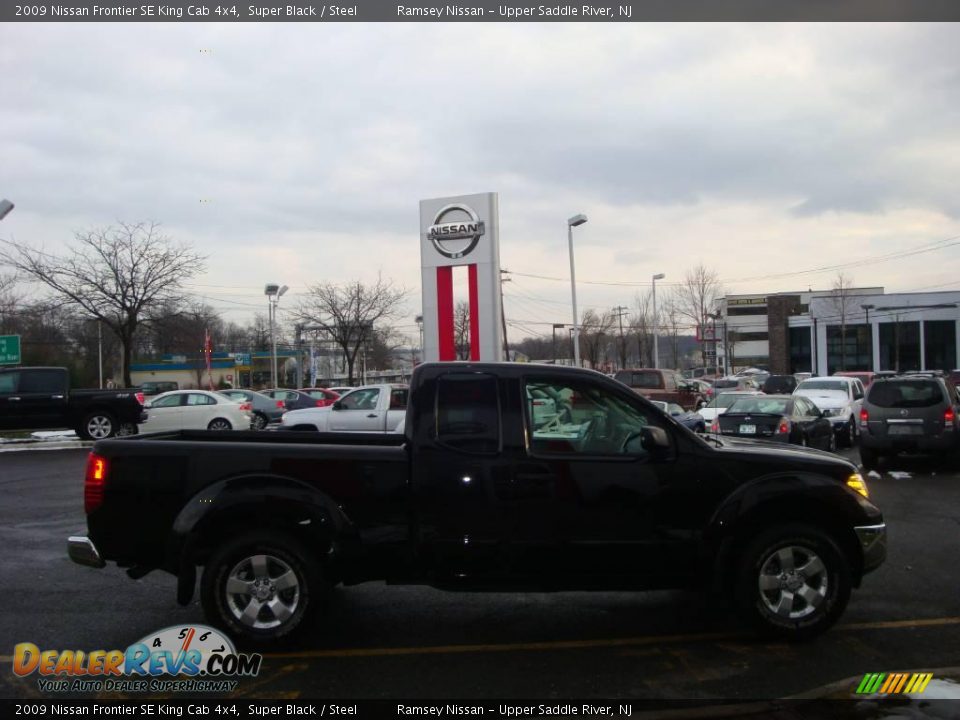 2009 Nissan Frontier SE King Cab 4x4 Super Black / Steel Photo #11