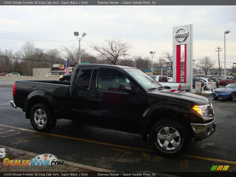 2009 Nissan Frontier SE King Cab 4x4 Super Black / Steel Photo #12