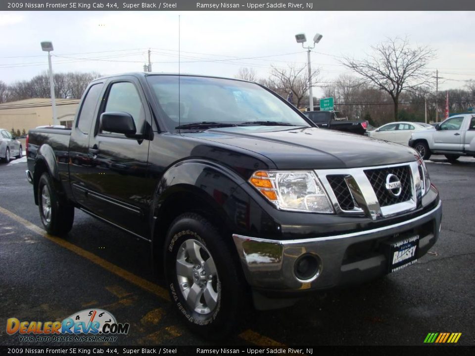 2009 Nissan Frontier SE King Cab 4x4 Super Black / Steel Photo #13