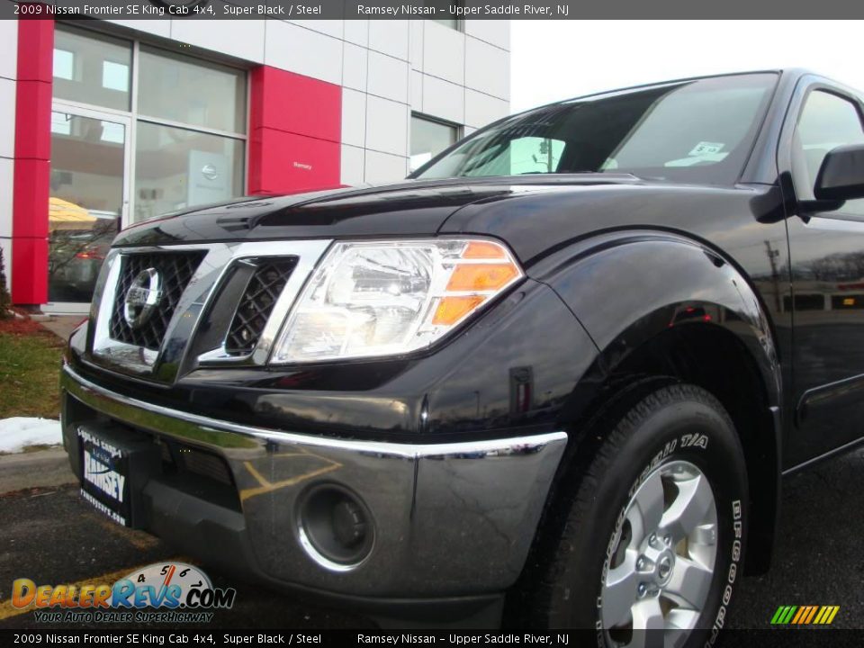 2009 Nissan Frontier SE King Cab 4x4 Super Black / Steel Photo #16