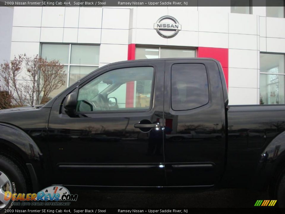 2009 Nissan Frontier SE King Cab 4x4 Super Black / Steel Photo #17