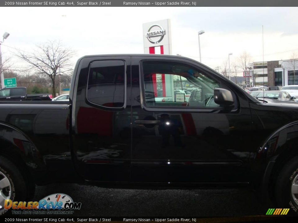 2009 Nissan Frontier SE King Cab 4x4 Super Black / Steel Photo #21