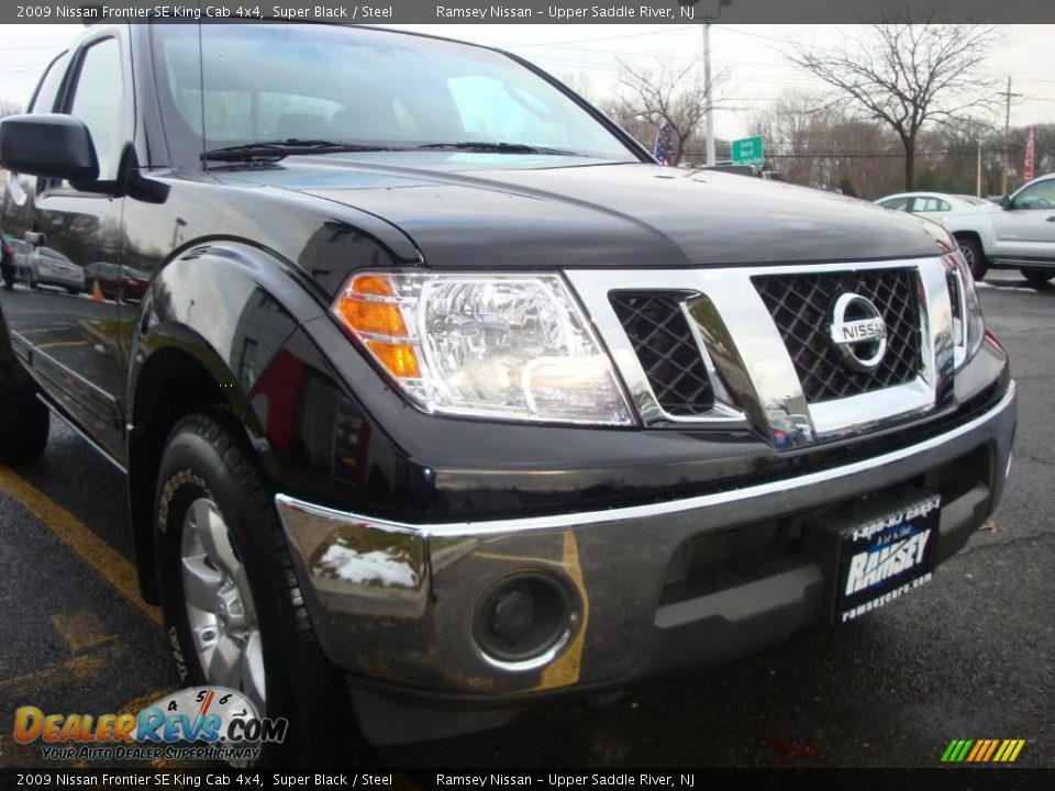 2009 Nissan Frontier SE King Cab 4x4 Super Black / Steel Photo #22