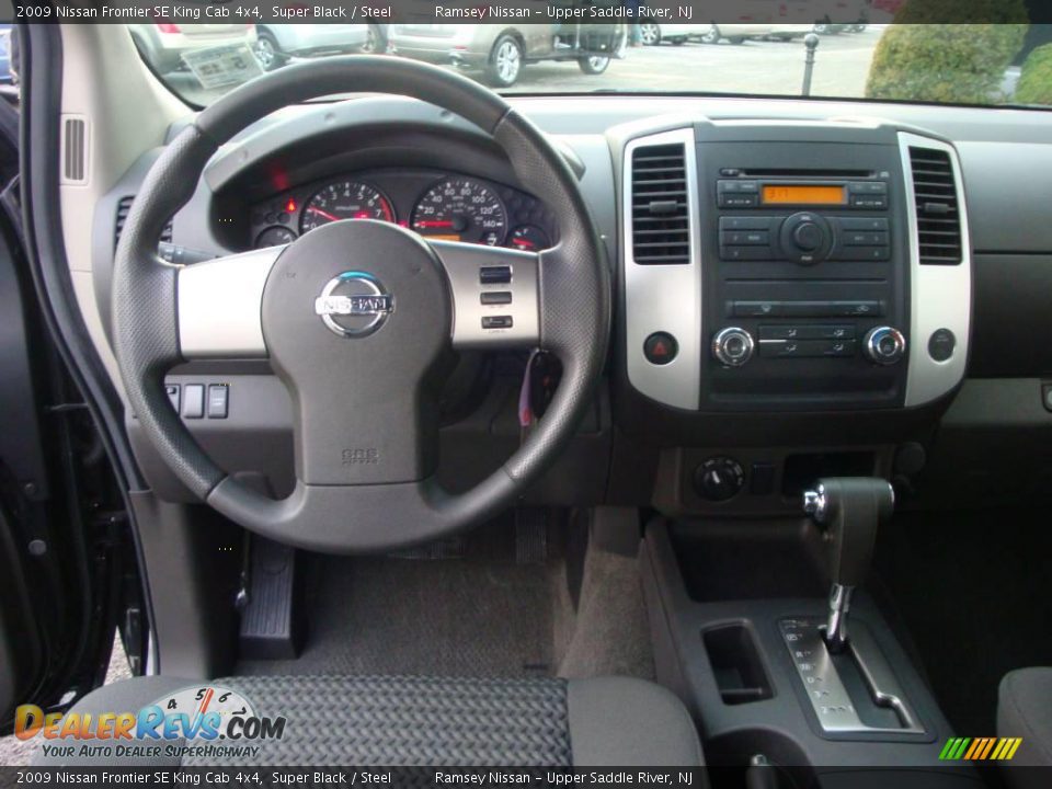 2009 Nissan Frontier SE King Cab 4x4 Super Black / Steel Photo #32