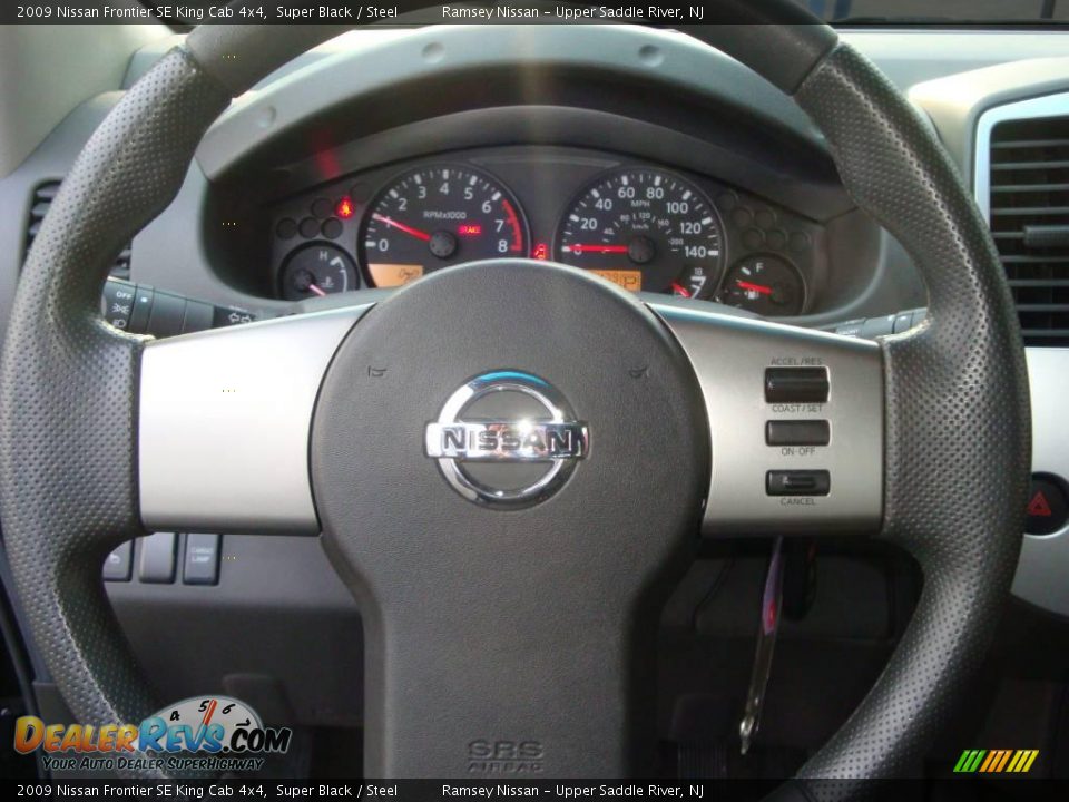 2009 Nissan Frontier SE King Cab 4x4 Super Black / Steel Photo #33