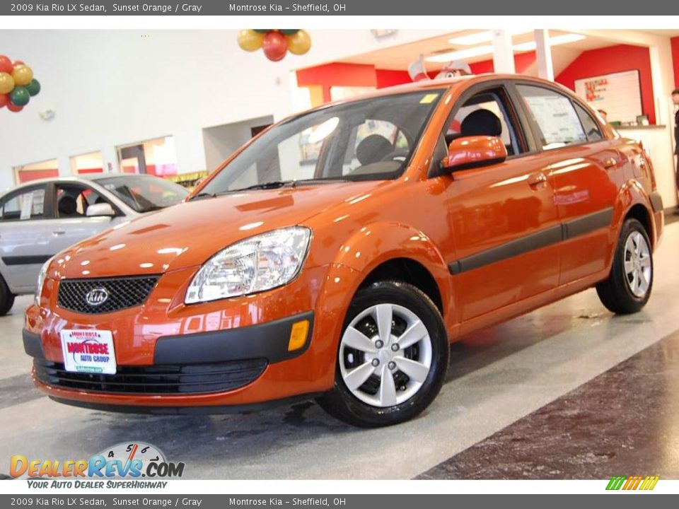 2009 Kia Rio LX Sedan Sunset Orange / Gray Photo #1