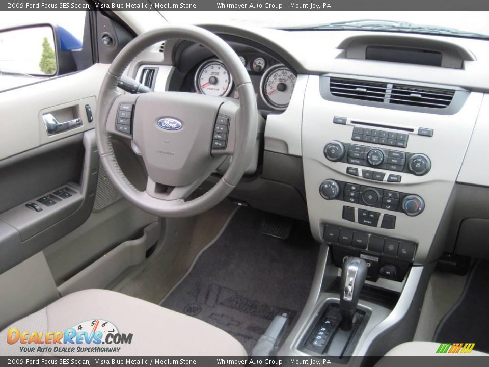 2009 Ford Focus SES Sedan Vista Blue Metallic / Medium Stone Photo #7