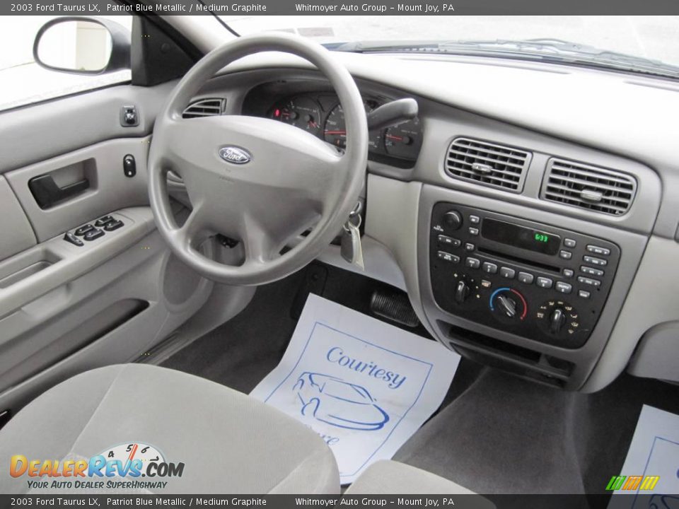 2003 Ford Taurus LX Patriot Blue Metallic / Medium Graphite Photo #7