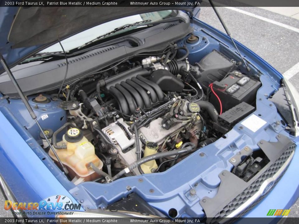 2003 Ford Taurus LX Patriot Blue Metallic / Medium Graphite Photo #9