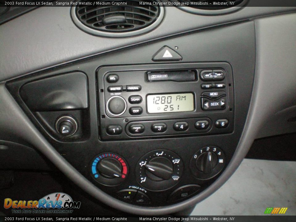 2003 Ford Focus LX Sedan Sangria Red Metallic / Medium Graphite Photo #4