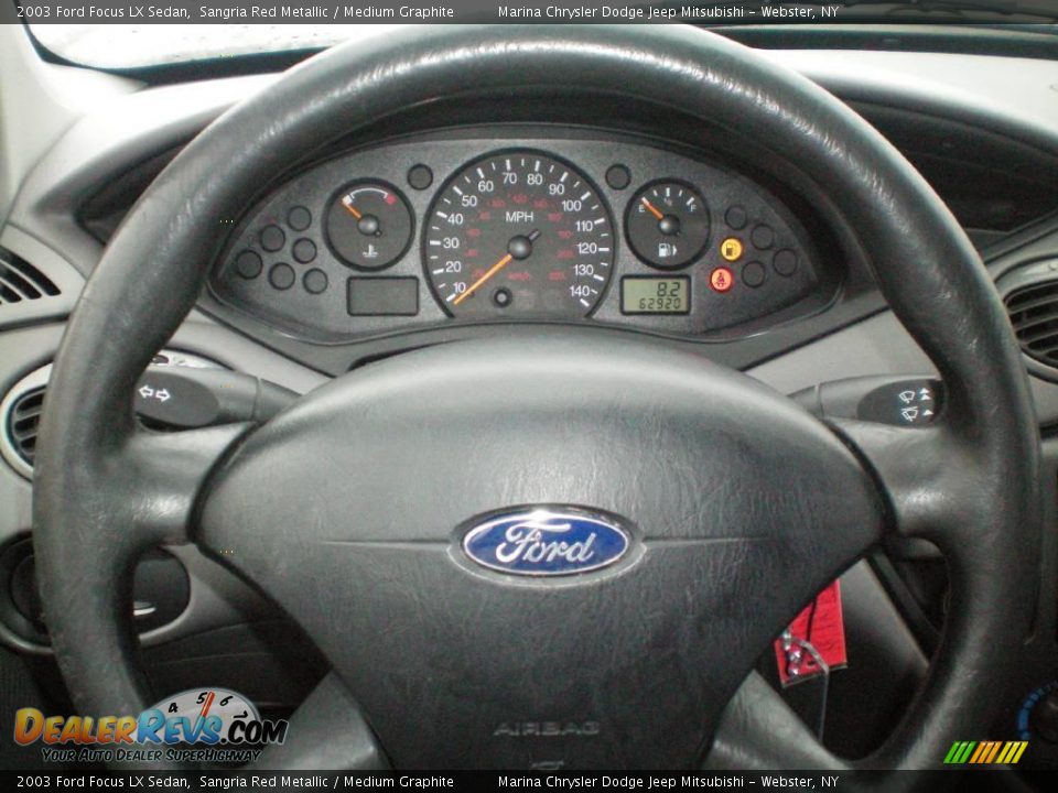 2003 Ford Focus LX Sedan Sangria Red Metallic / Medium Graphite Photo #5